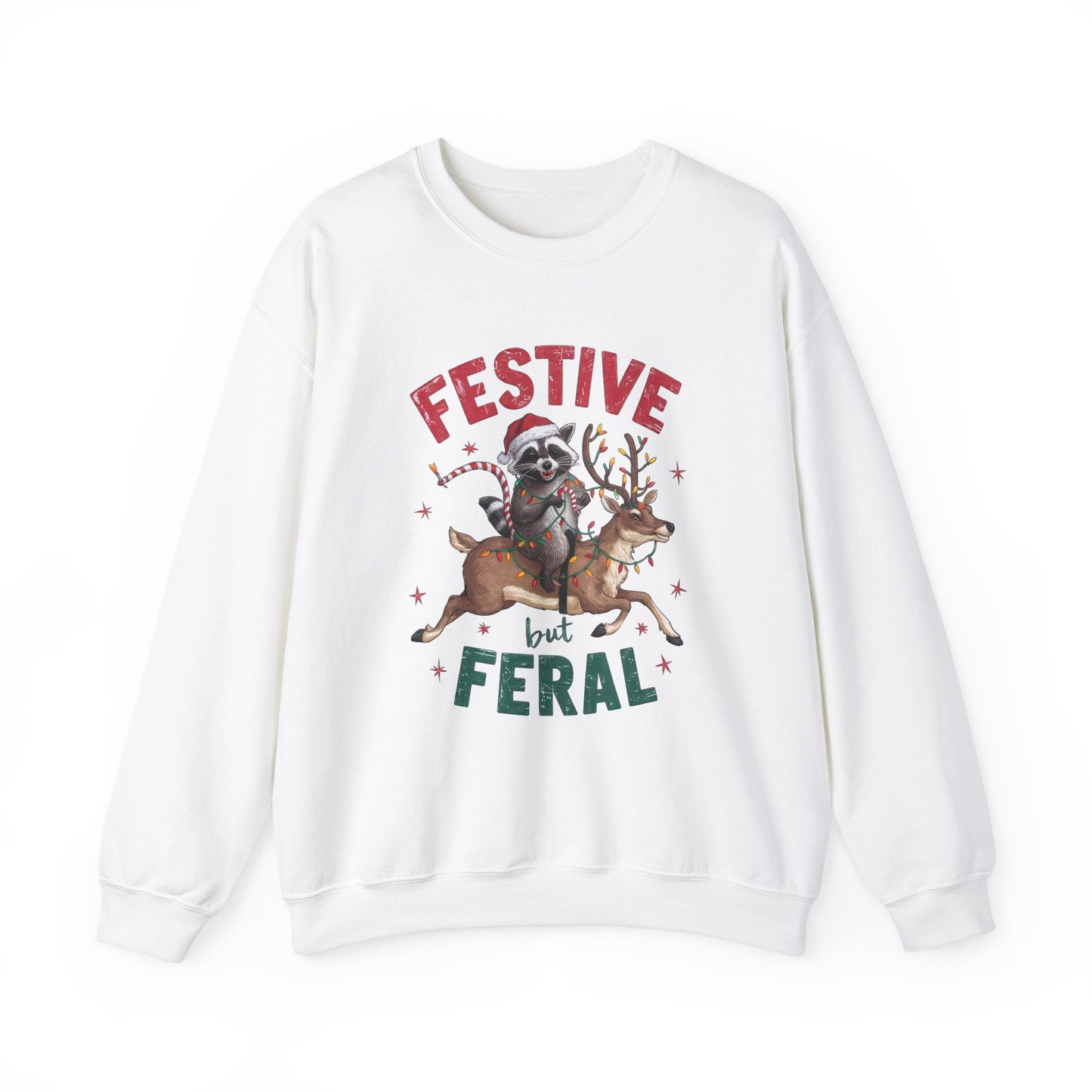 Front view of a white sweatshirt featuring a festive illustration of a raccoon (trash panda) holding Christmas lights and the text "Festive but Feral." Part of the Vivid Divergence Sensory Friendly Unisex Sweater Jumper Range.