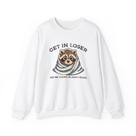 Front view of a white sweatshirt featuring a raccoon wrapped in a blanket with the text "Get in Loser, We're Going Blanky Mode." Part of the Vivid Divergence Sensory Friendly Unisex Sweater Jumper Range.