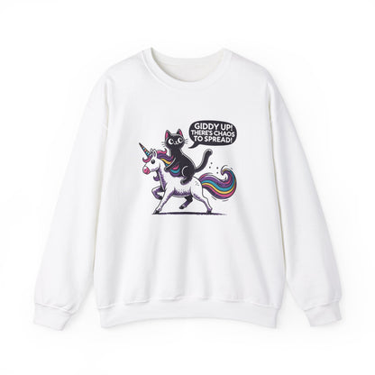 Front view of a white sweater jumper featuring a cartoon cat riding a unicorn with rainbow mane and the text "Giddy Up, There's Chaos to Spread." Part of the Vivid Divergence Sensory Friendly Unisex Sweater Jumper Range.