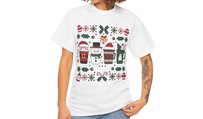 del wearing a white T-shirt featuring a festive holiday pattern with coffee cups, snowflakes, and Christmas elements, styled casually. Part of the Vivid Divergence Sensory Friendly Unisex Tees Range.
