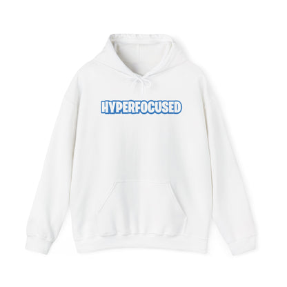 Front view of a white hoodie featuring the word "HYPERFOCUSED" in a bold, blue Fortnite-style font. Part of the Vivid Divergence Sensory Friendly Unisex Hoodie Range.