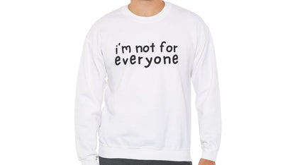 Model wearing a white sweater jumper with the text "I'm Not For Everyone" in bold black lettering. Part of the Vivid Divergence Sensory Friendly Unisex Sweater Jumper Range.