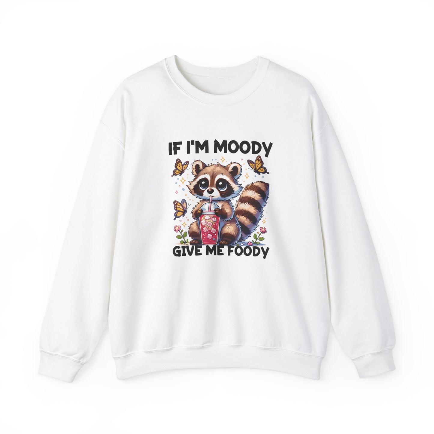 Front view of a white sweater jumper with the text "If I'm Moody, Give Me Foody" and a cartoon raccoon illustration holding snacks. Part of the Vivid Divergence Sensory Friendly Unisex Sweater Jumper Range.