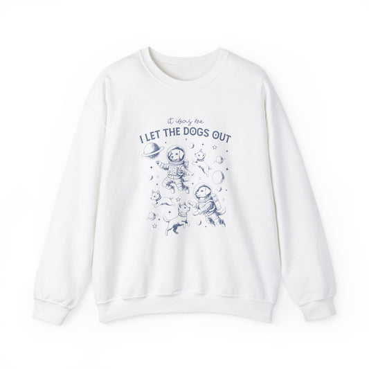 Front view of a white sweatshirt featuring playful dog illustrations with the text "It Was Me, I Let The Dogs Out." Part of the Vivid Divergence Sensory Friendly Unisex Sweater Jumper Range.