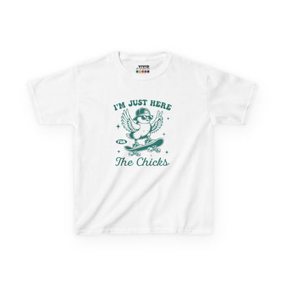 White kids' T-shirt featuring a playful "I'm Just Here for the Chicks" design with a cute chick illustration, perfect for Easter fun. Hop into the season in style and shop Easter shirts online today!