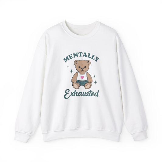 Front view of a white sweatshirt featuring a cute teddy bear wearing an apron with the text "Mentally Exhausted." Part of the Vivid Divergence Sensory Friendly Unisex Sweater Jumper Range.