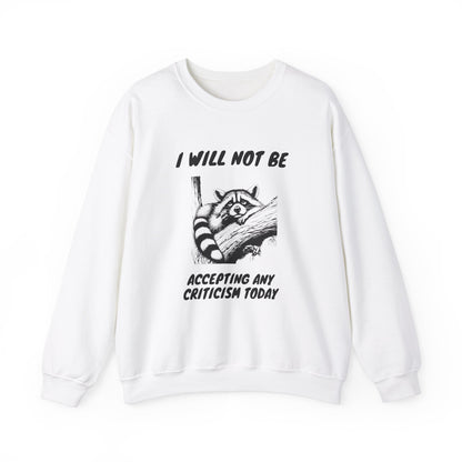 Front view of a white sweater jumper with the text "I Will Not Be Accepting Any Criticism Today" and a cartoon illustration of a hand with a raised finger. Part of the Vivid Divergence Sensory Friendly Unisex Sweater Jumper Range.