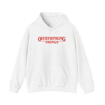 Front view of a white hoodie featuring the text "Overthinking Things" in the iconic Stranger Things font and style. Part of the Vivid Divergence Sensory Friendly Unisex Hoodie Range.