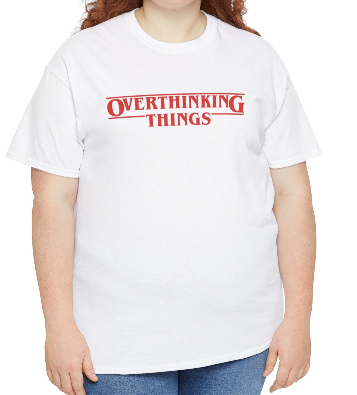 Model wearing a white T-shirt with "Overthinking Things" in red text, parodying Stranger Things. Part of the Vivid Divergence Sensory Friendly Unisex Tees Range.