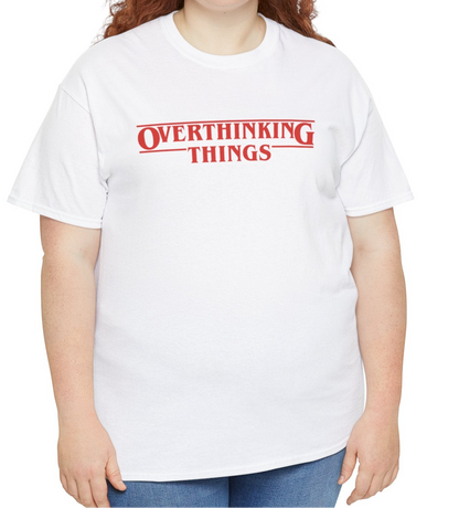 Model wearing a white T-shirt with "Overthinking Things" in red text, parodying Stranger Things. Part of the Vivid Divergence Sensory Friendly Unisex Tees Range.