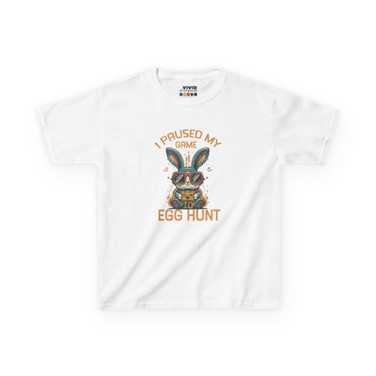 White kids' T-shirt with "I Paused My Game to Egg Hunt" and a gaming-themed bunny, a perfect holiday outfit for video game lovers. Hop into the season in style and shop Easter shirts online today!
