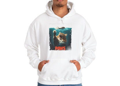 Model wearing a white hoodie featuring the "Paws" Jaws parody design with a cat’s paw reaching toward a swimmer. Part of the Vivid Divergence Sensory Friendly Unisex Hoodie Range.