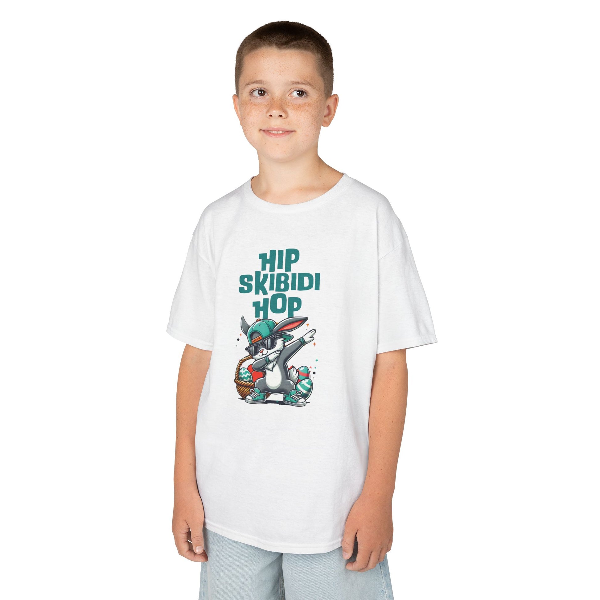 Child wearing a white Easter T-shirt featuring a dabbing Skibidi bunny with "Hip Skibidi Hop" text, a playful and trendy outfit. Hop into the season in style and shop Easter shirts online today!