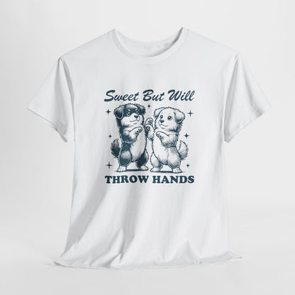 Hanging white T-shirt featuring "Sweet But Will Throw Hands" text with two dogs in navy blue-tone design. Part of the Vivid Divergence Sensory Friendly Unisex Tees Range.