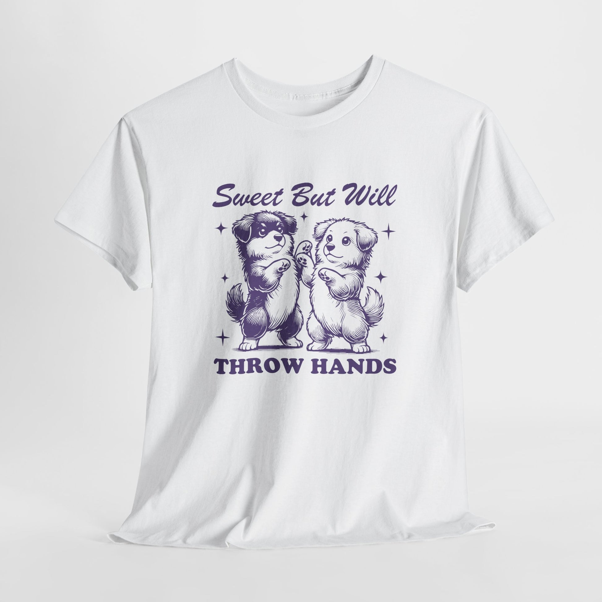 Hanging white T-shirt featuring "Sweet But Will Throw Hands" text with two dogs in purple-tone design. Part of the Vivid Divergence Sensory Friendly Unisex Tees Range.