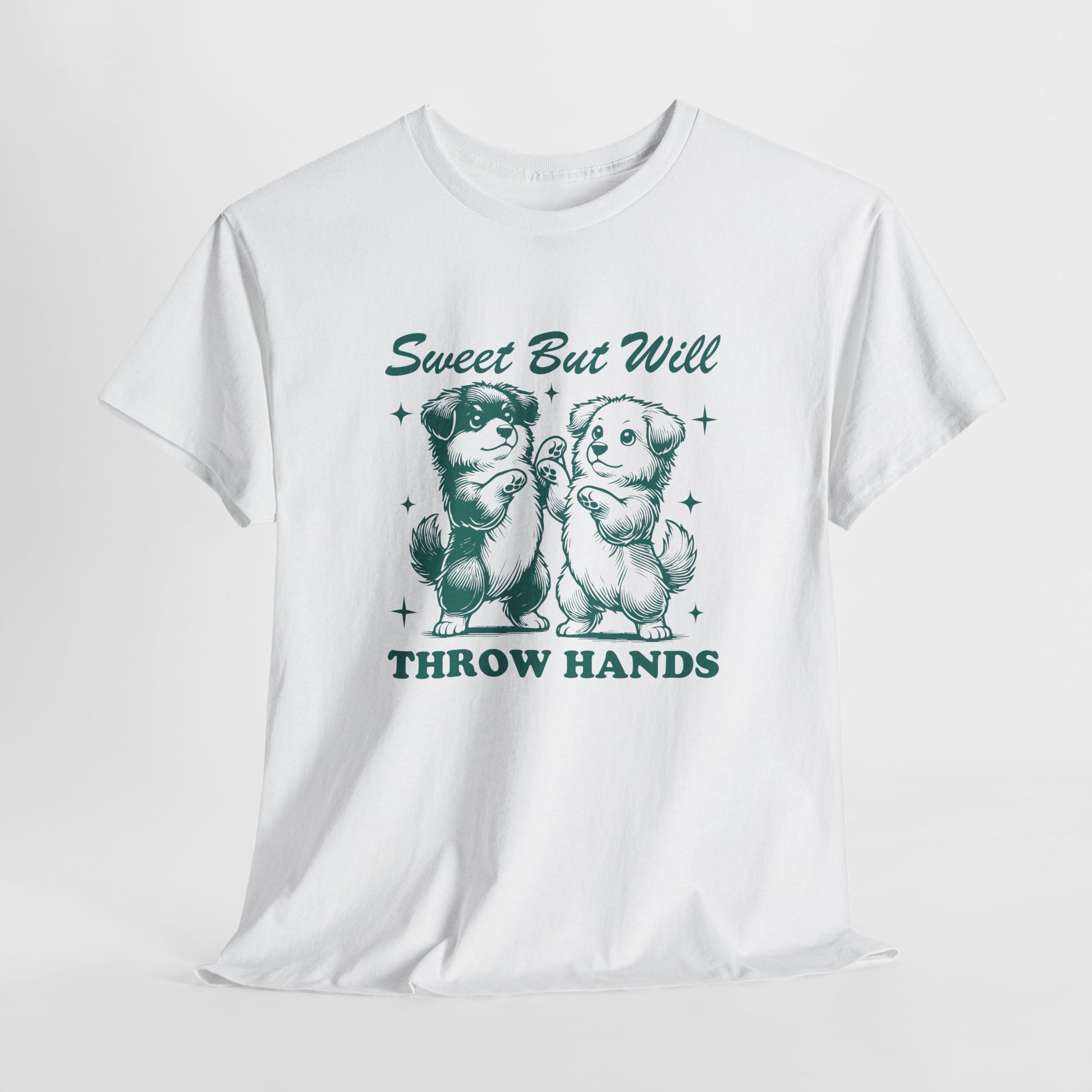 Hanging white T-shirt featuring "Sweet But Will Throw Hands" text with an illustration of two dogs, one wearing a bandana and the other smiling. Part of the Vivid Divergence Sensory Friendly Unisex Tees Range.