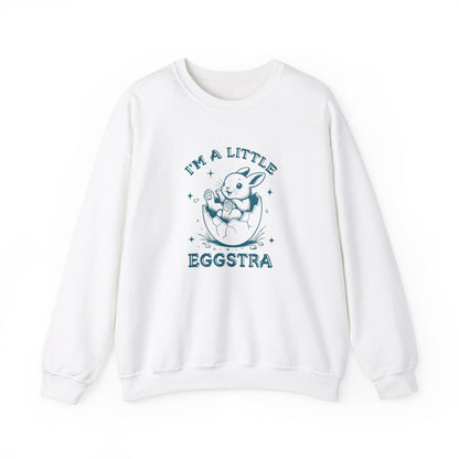 Front view of white sweater jumper with teal “I’m a Little Eggstra” bunny design. Part of the Vivid Divergence Sensory Friendly Unisex Sweater Jumper Range.

