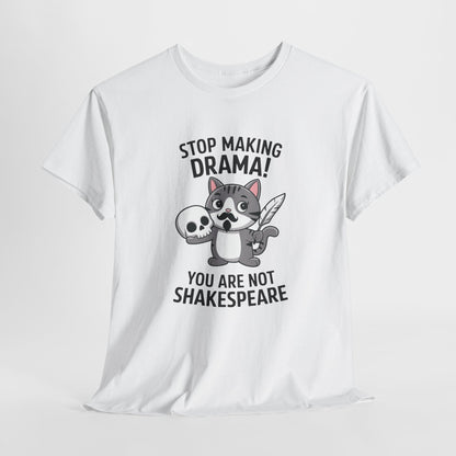 Hanging front view of a white T-shirt featuring a cute cat holding a skull and text that reads "Stop Making Drama! You Are Not Shakespeare." Part of the Vivid Divergence Sensory Friendly Unisex Tees Range.