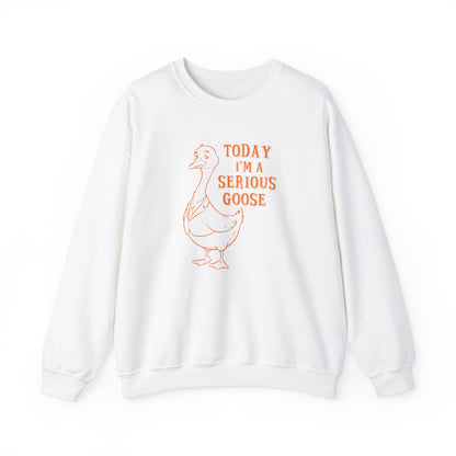 Front view of a white sweatshirt with "Today I'm a Serious Goose" in orange letters and a cartoon goose illustration. Part of the Vivid Divergence Sensory Friendly Unisex Sweater Jumper Range.