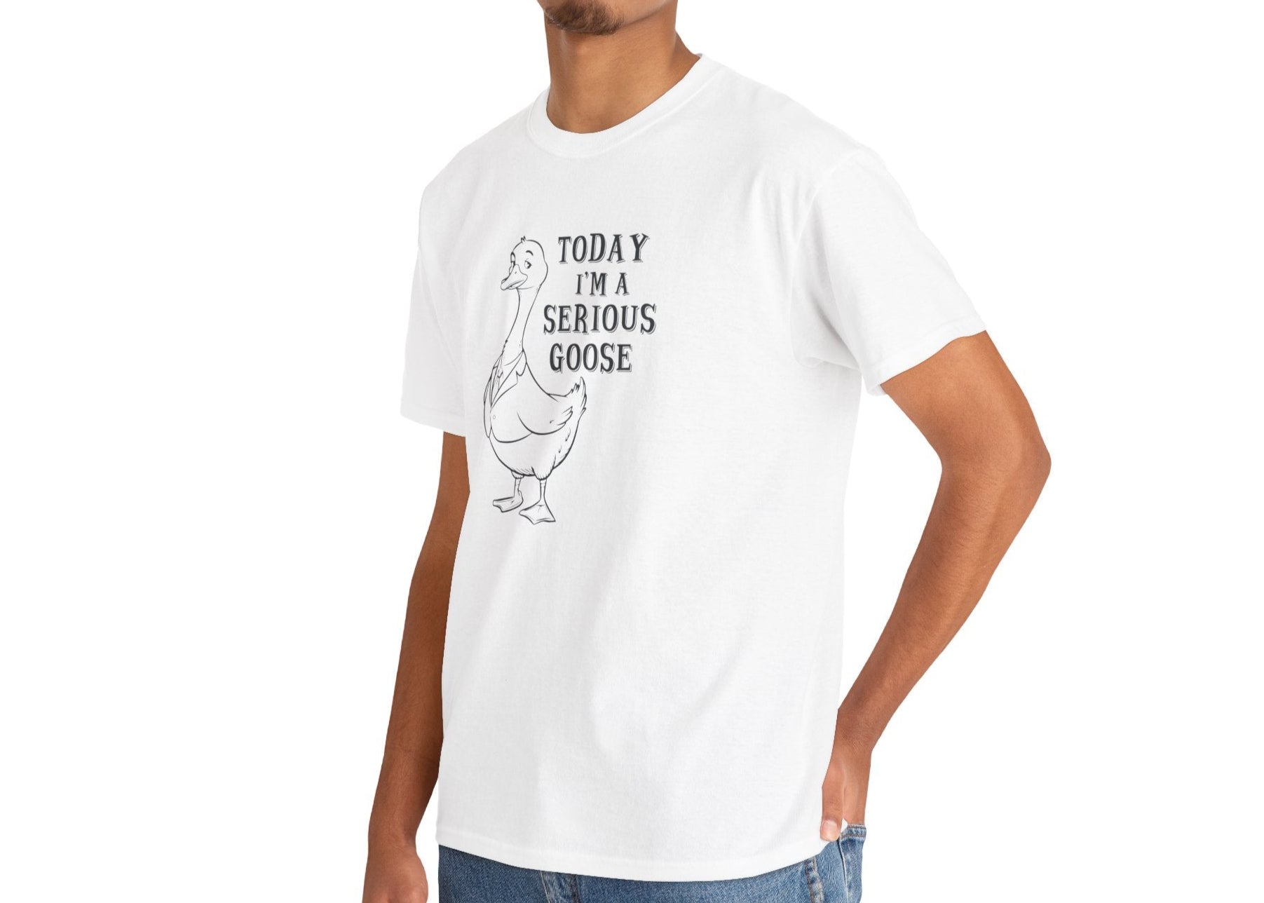 Model wearing a white T-shirt with "Today I'm A Serious Goose" in gray text and a simple goose illustration. Part of the Vivid Divergence Sensory Friendly Unisex Tees Range.
