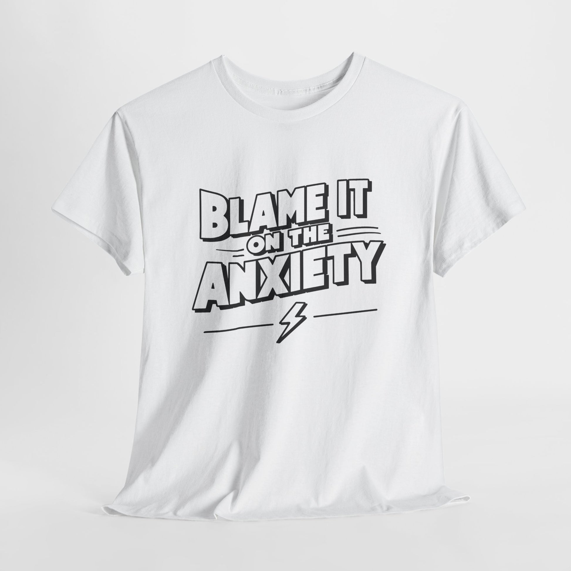 Front view of a white T-shirt with the text "Blame It on the Anxiety" in bold lettering. Part of the Vivid Divergence Sensory Friendly Unisex Tees Range.