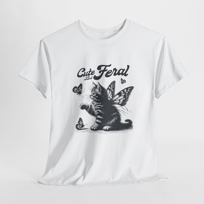 White T-shirt with "Cute but Feral" cat and butterfly design, laid flat on a white background. Part of the Vivid Divergence Sensory Friendly Unisex Tees Range.