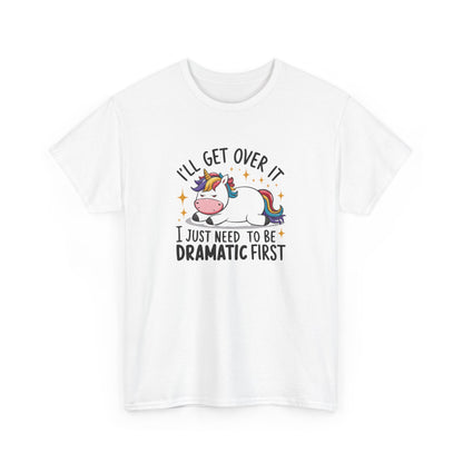 Front view of a white T-shirt featuring a unicorn and cow graphic with the text "I'll Get Over It, I Just Need To Be Dramatic First." Part of the Vivid Divergence Sensory Friendly Unisex Tees Range.