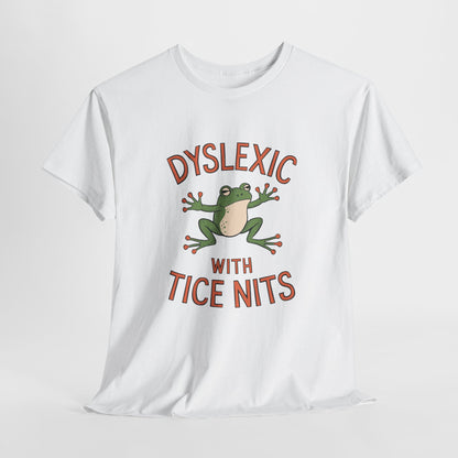 White T-shirt with a graphic of a green frog and the text "Dyslexic with Tice Nits," laid flat. Part of the Vivid Divergence Sensory Friendly Unisex Tees Range.
