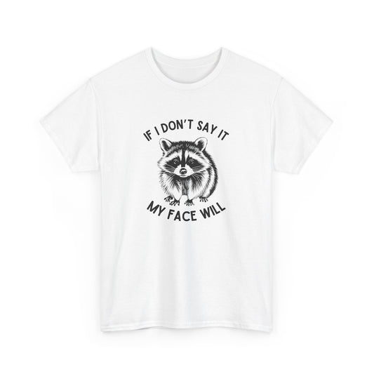Front view of a white T-shirt featuring a raccoon face graphic with the text "If I Don't Say It, My Face Will." Part of the Vivid Divergence Sensory Friendly Unisex Tees Range.