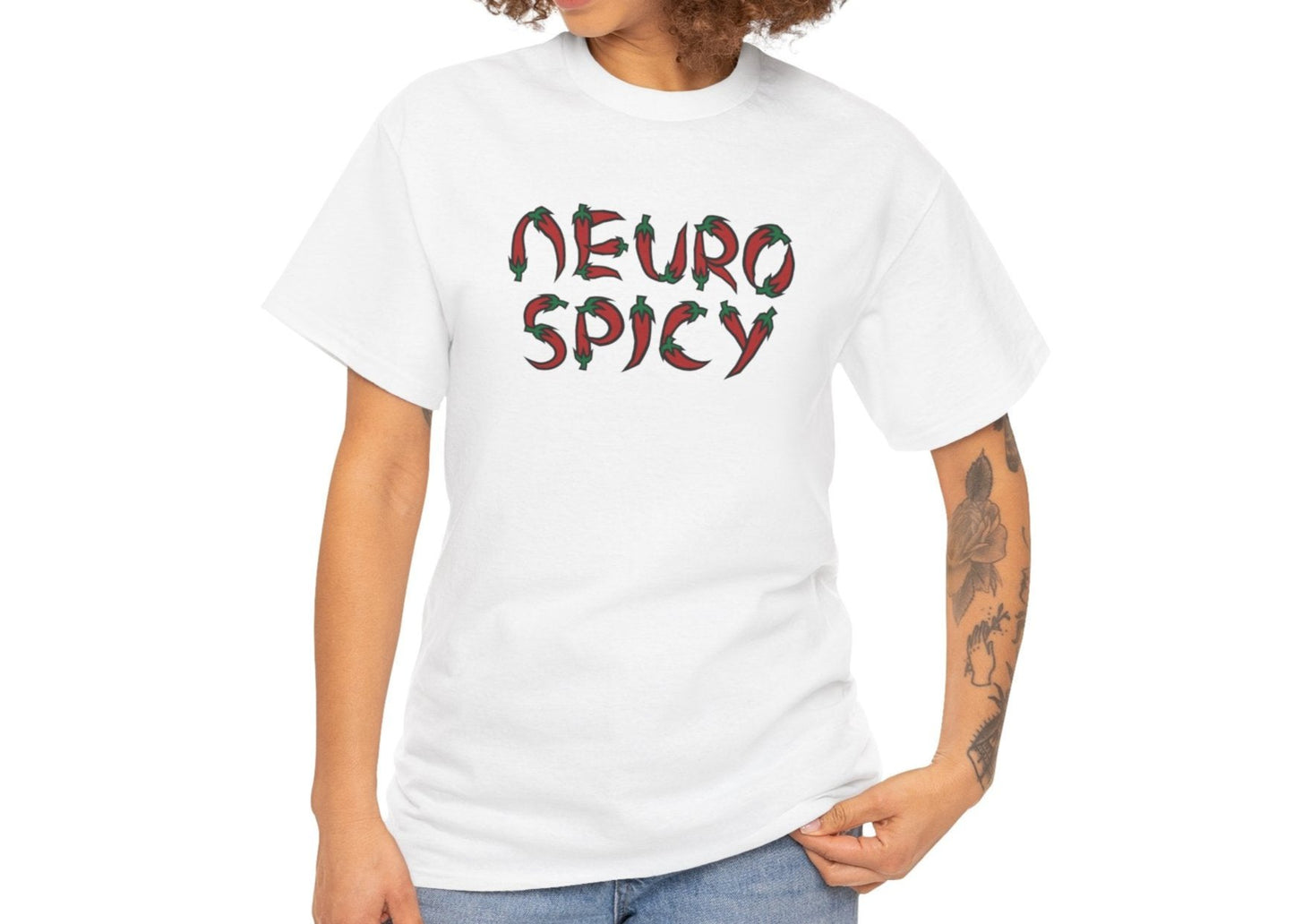 Model wearing a white T-shirt with "Neuro Spicy" text, styled casually with jeans. Part of the Vivid Divergence Sensory Friendly Unisex Tees Range.