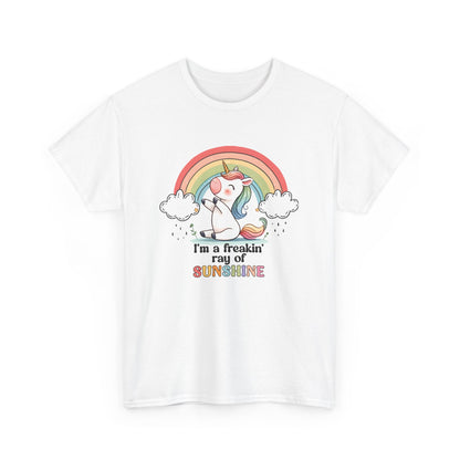 Front view of a white T-shirt featuring a rainbow and unicorn graphic with the text "I'm A Freakin Ray Of Sunshine." Part of the Vivid Divergence Sensory Friendly Unisex Tees Range.
