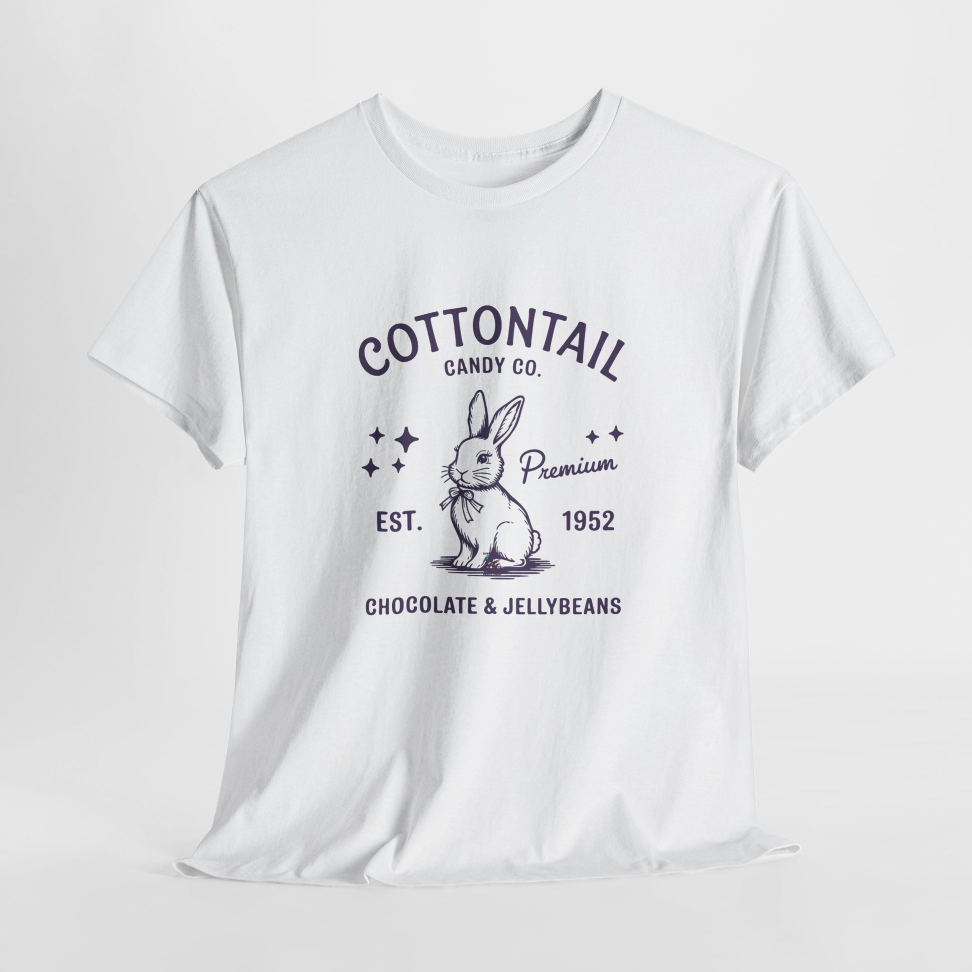 White T-shirt hanging, featuring a vintage-inspired "Cottontail Candy Co." logo with a charming bunny, perfect for a classic Easter look. Hop into the season in style and shop Easter shirts online today!