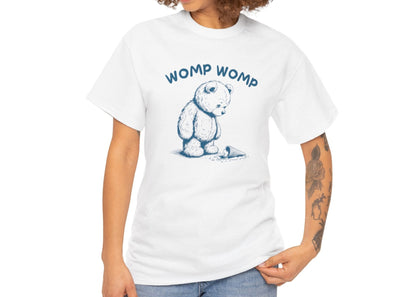 Model with curly hair wearing a white T-shirt featuring "Womp Womp" text with a sad bear looking at a dropped ice cream cone in blue-tone design. Part of the Vivid Divergence Sensory Friendly Unisex Tees Range.