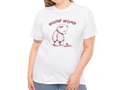 Model wearing a white T-shirt featuring "Womp Womp" text with a sad bear looking at a dropped ice cream cone in red-tone design. Part of the Vivid Divergence Sensory Friendly Unisex Tees Range.
