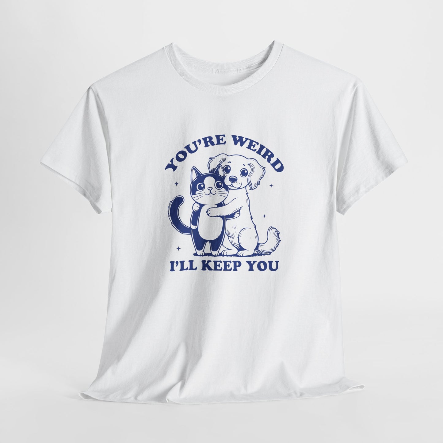 Hanging white T-shirt with a "You're Weird, I'll Keep You" design featuring a dog hugging a cat in navy blue. Part of the Vivid Divergence Sensory Friendly Unisex Tees Range.