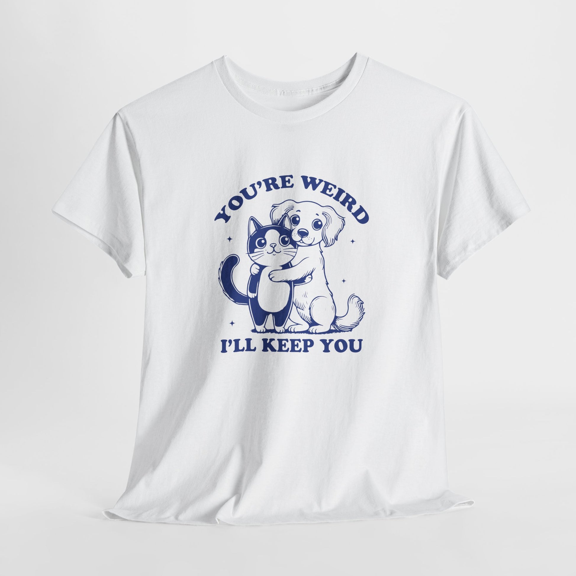 Hanging white T-shirt with a "You're Weird, I'll Keep You" design featuring a dog hugging a cat in navy blue. Part of the Vivid Divergence Sensory Friendly Unisex Tees Range.