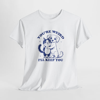 Hanging white T-shirt with a "You're Weird, I'll Keep You" design featuring a dog hugging a cat in navy blue. Part of the Vivid Divergence Sensory Friendly Unisex Tees Range.