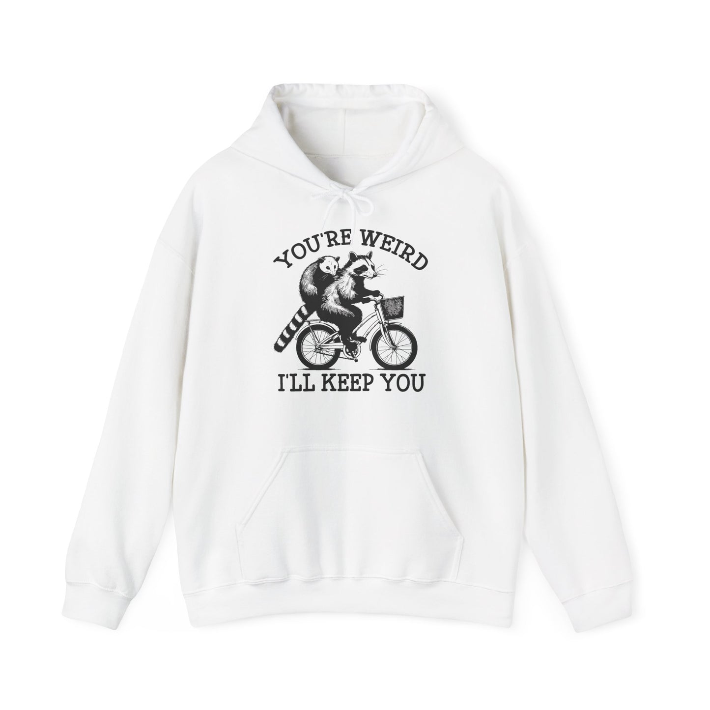 Front view of a white hoodie featuring the text "You're Weird, I'll Keep You" with a cartoon illustration of two raccoons riding a bicycle. Part of the Vivid Divergence Sensory Friendly Unisex Hoodie Range.
