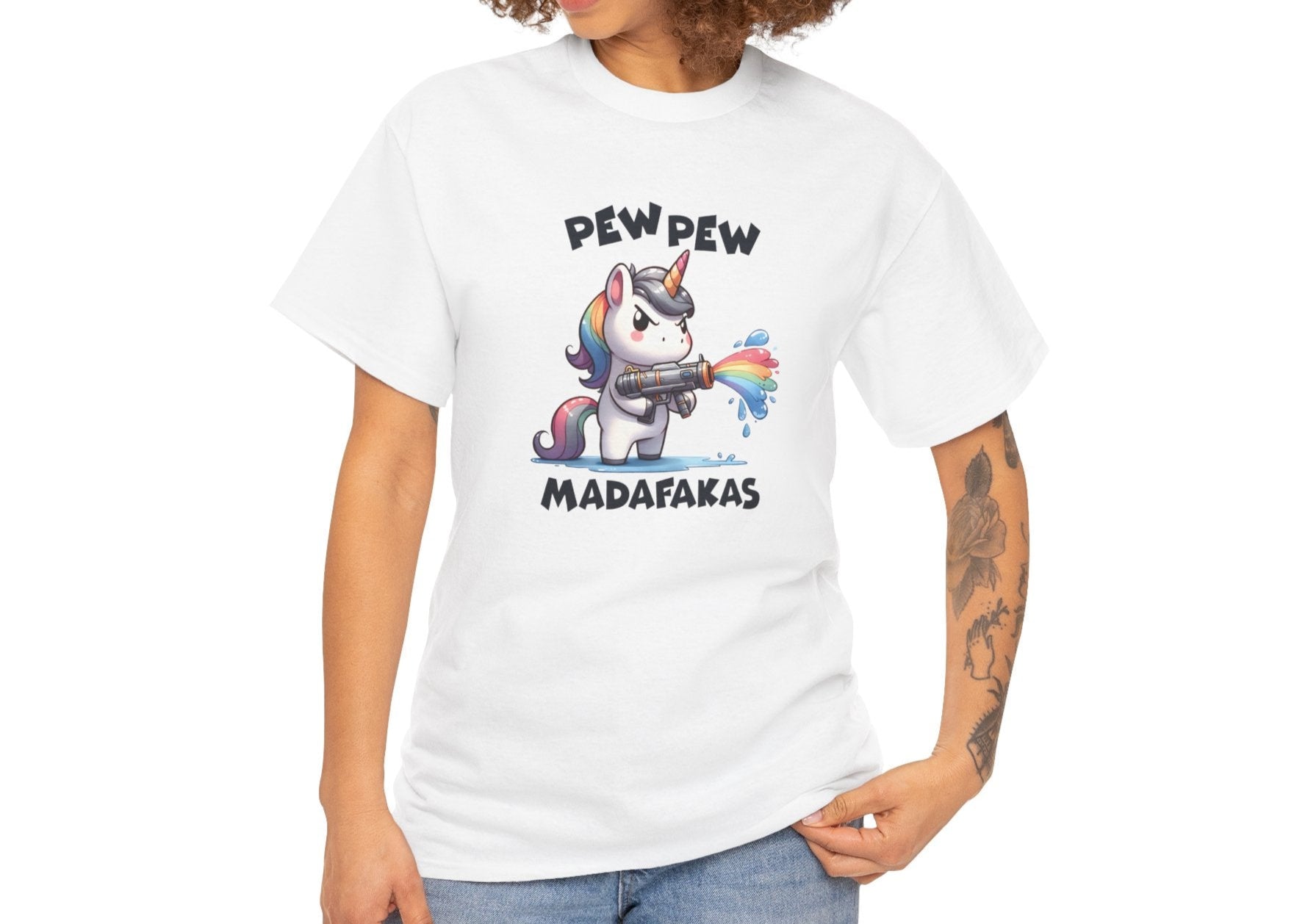 Woman wearing a white T-shirt with a "Pew Pew Madafakas" unicorn graphic, styled casually. Part of the Vivid Divergence Sensory Friendly Unisex Tees Range.
