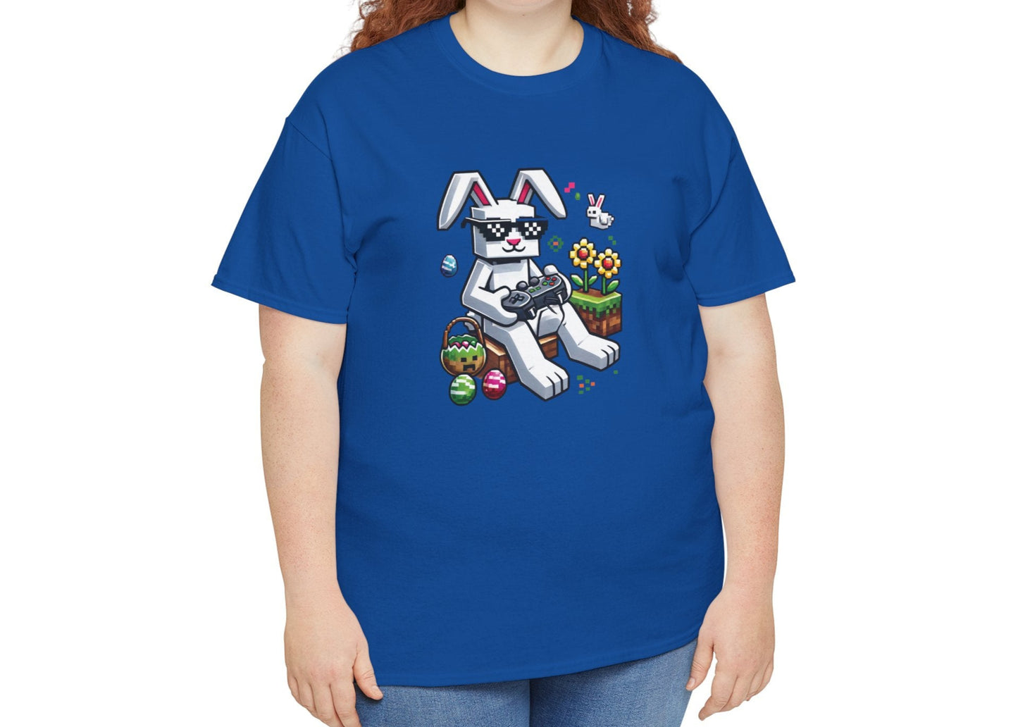 Woman wearing a blue Easter T-shirt featuring a Minecraft-style bunny with pixel eggs, a perfect mix of gaming and holiday fun. Hop into the season in style and shop Easter shirts online today!