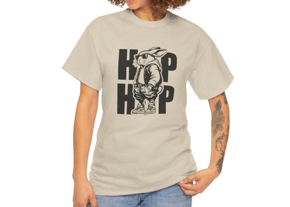 Woman wearing a sand Easter T-shirt featuring a hip-hop bunny and "HOP HOP" text, perfect for a unique Easter outfit. Hop into the season in style and shop Easter shirts online today!