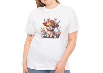 Woman wearing a white Easter T-shirt featuring a cute Highland cow with bunny ears, Easter eggs, and flowers, a charming holiday outfit. Hop into the season in style and shop Easter shirts online today!