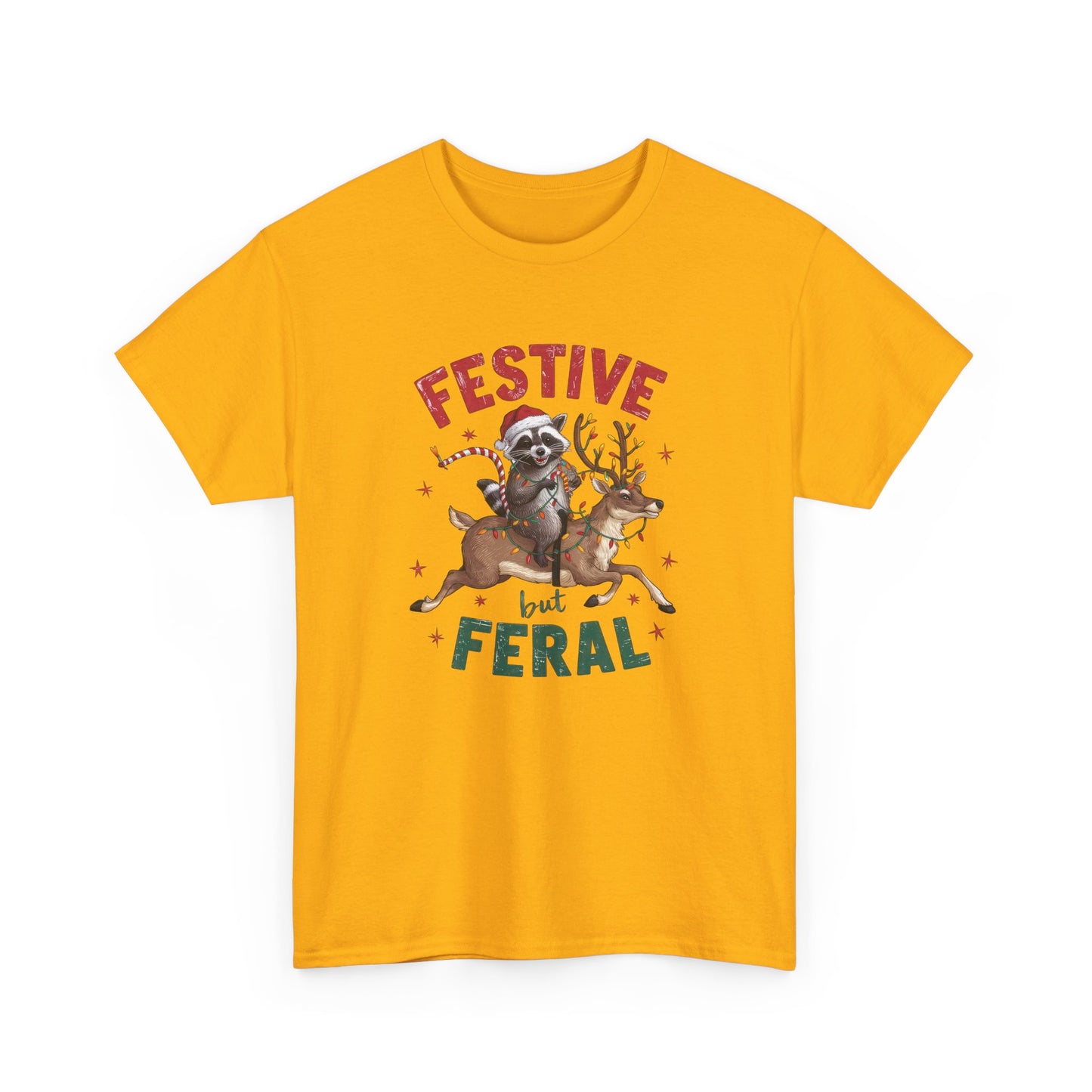 Front view of a yellow T-shirt featuring a festive illustration of a raccoon (trash panda) holding Christmas lights and the text "Festive but Feral." Part of the Vivid Divergence Sensory Friendly Unisex Tees Range.